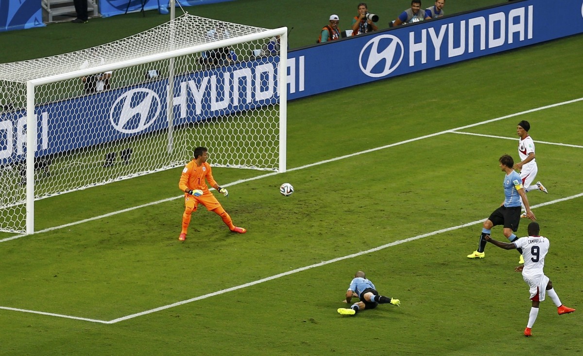 Costa Rica's Campbell shoots to score a goal against Uruguay Uruguay v Costa Rica