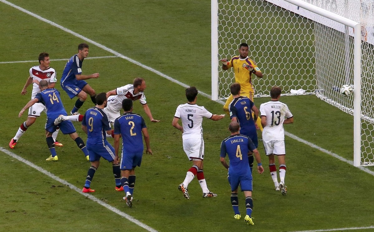 Germany's Hoewedes heads the ball as he tries to score against Argentina during 2014 World Cup final at the Maracana stadium in Rio de Janeiro. Germany vs Argentina