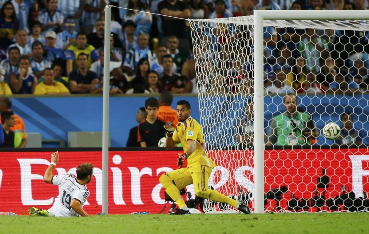 Germany's Goetze shoots to score against Argentina's Romero during extra time in 2014 World Cup final at the Maracana stadium in Rio de Janeiro. Germany vs Argentina