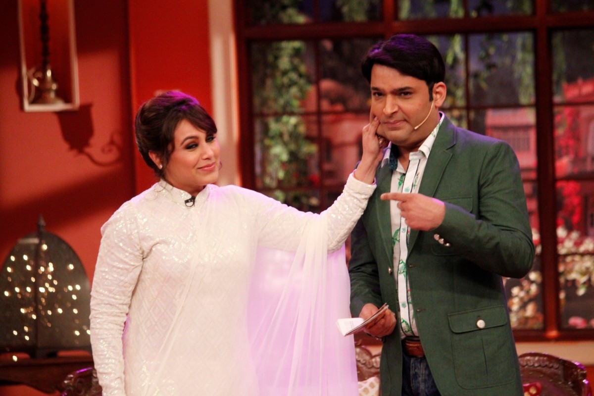 Rani Mukerji jokingly pulls Kapil Sharma's cheeks. Rani promotes 'Mardaani' on 'Comedy Nights With Kapil'