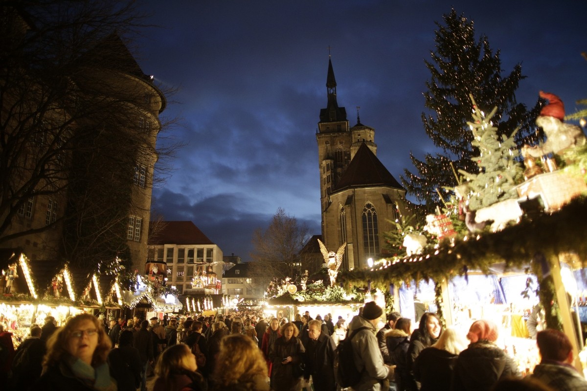People visit a traditional Christmas market in the city centre of Stuttgart December 19, 2012. Stuttgart