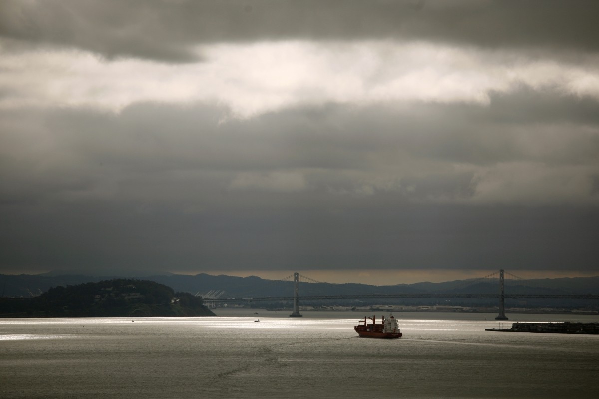 A container ship streams toward the Port of Oakland in this view from a vista point in Sausalito, California April 23, 2012. Oakland