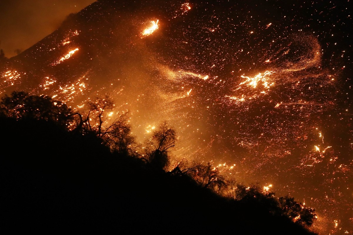 The Creek Fire burns on a hillside in the Shadow Hills neighborhood on December 5, 2017 in Los Angeles, California California wildfire