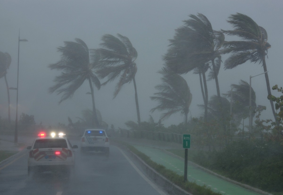 Police patrol the area as Hurricane Irma slams across islands in the northern Caribbean on Wednesday Hurricane Irma