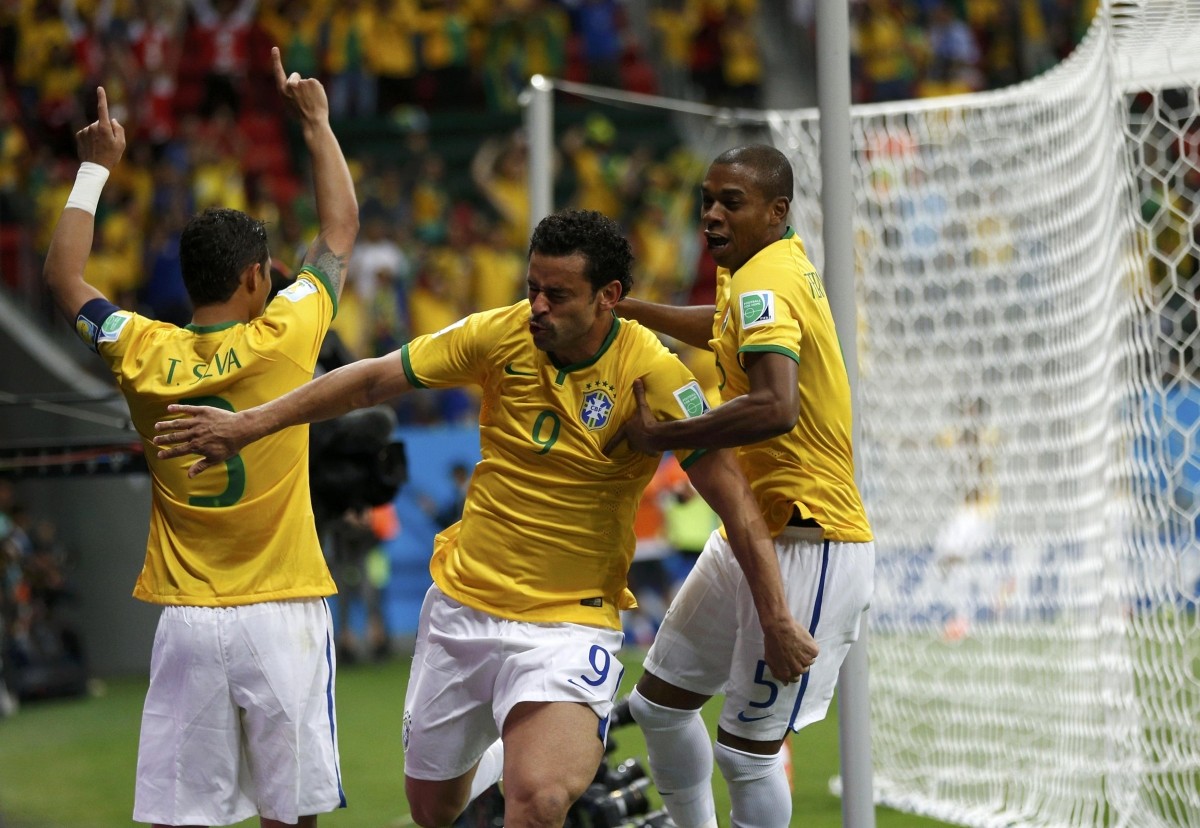 Brazil's Fred celebrates after scoring a goal during the 2014 World Cup Group A match between Cameroon and Brazil at the Brasilia national stadium Cameroon v Brazil