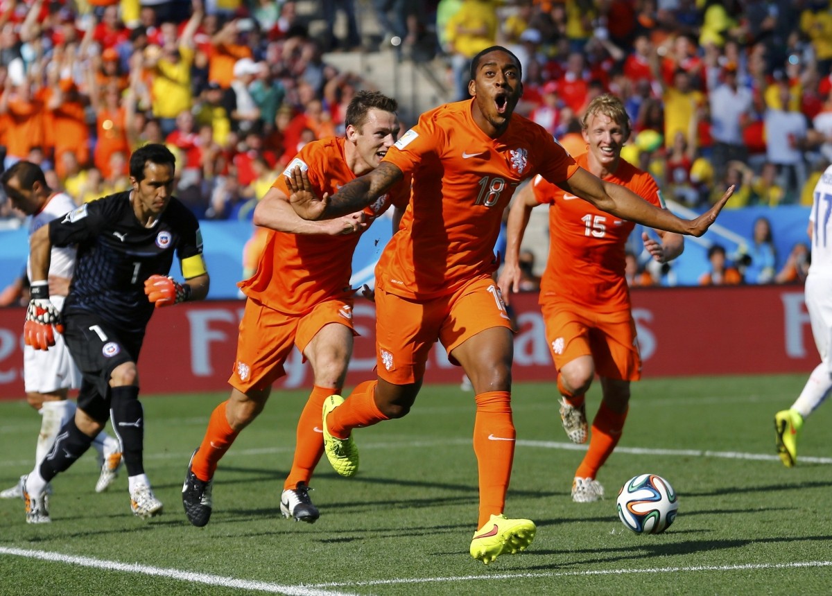 Fer of the Netherlands celebrates with teammates after scoring a goal during their 2014 World Cup Group B match against Chile at the Corinthians arena in Sao Paulo Netherlands v Chile