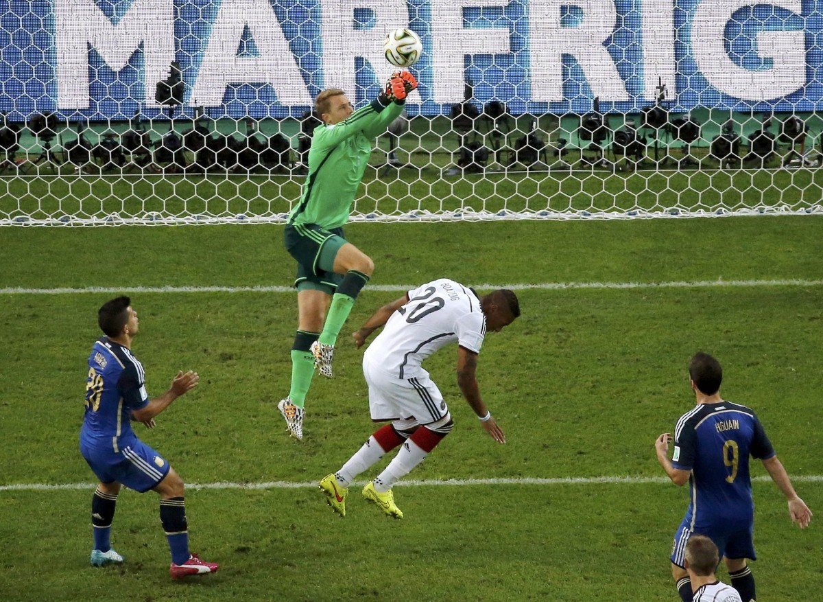 Germany's goalkeeper Manuel Neuer stops a shot by Argentina during 2014 World Cup final at the Maracana stadium in Rio de Janeiro. Germany vs Argentina