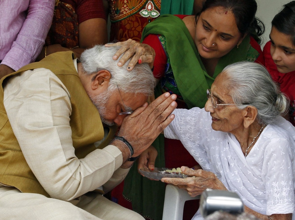 Hindu nationalist Modi, prime ministerial candidate for India's main opposition BJP, seeks blessings from his mother Heeraben at her residence in Gandhinagar Hindu nationalist Modi, prime ministerial candidate for India's main opposition BJP, seeks blessings from his mother Heeraben at her residence in Gandhinagar