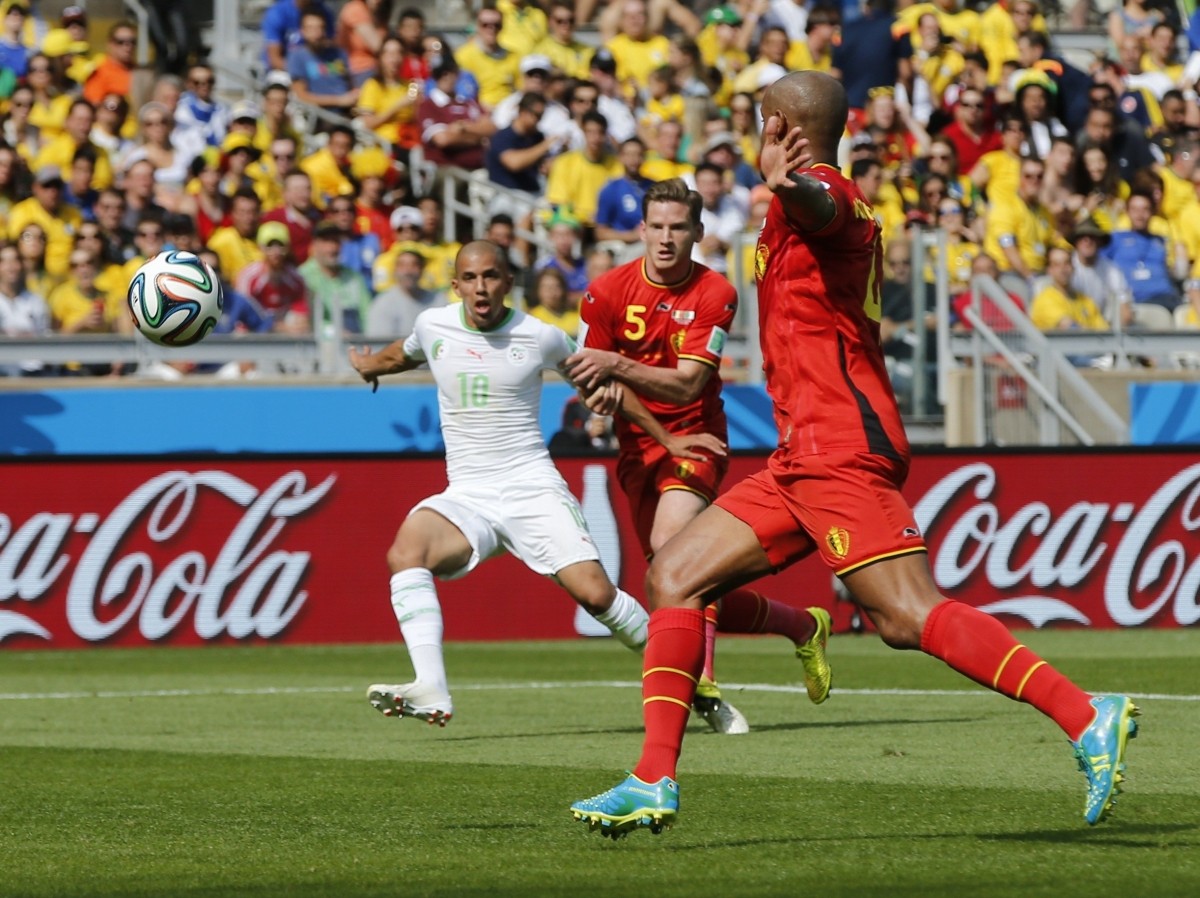 Algeria's Feghouli is fouled for a penalty by Belgium's Vertonghen during their 2014 World Cup Group H soccer match at the Mineirao stadium in Belo Horizonte Belgium v Algeria