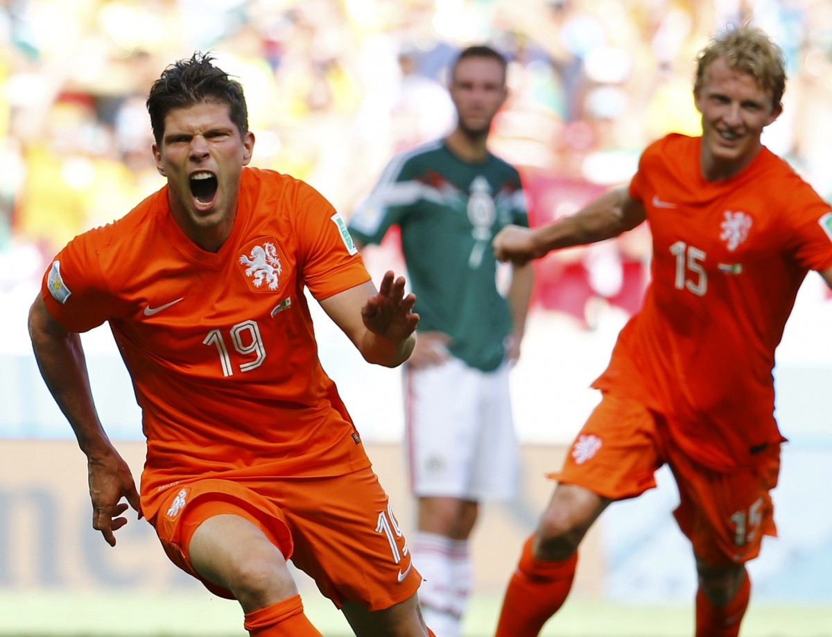 Klaas-Jan Huntelaar and Dirk Kuyt of the Netherlands celebrate Huntelaar's goal during their 2014 World Cup round of 16 game against Mexico at the Castelao arena in Fortaleza Netherlands vs Mexico