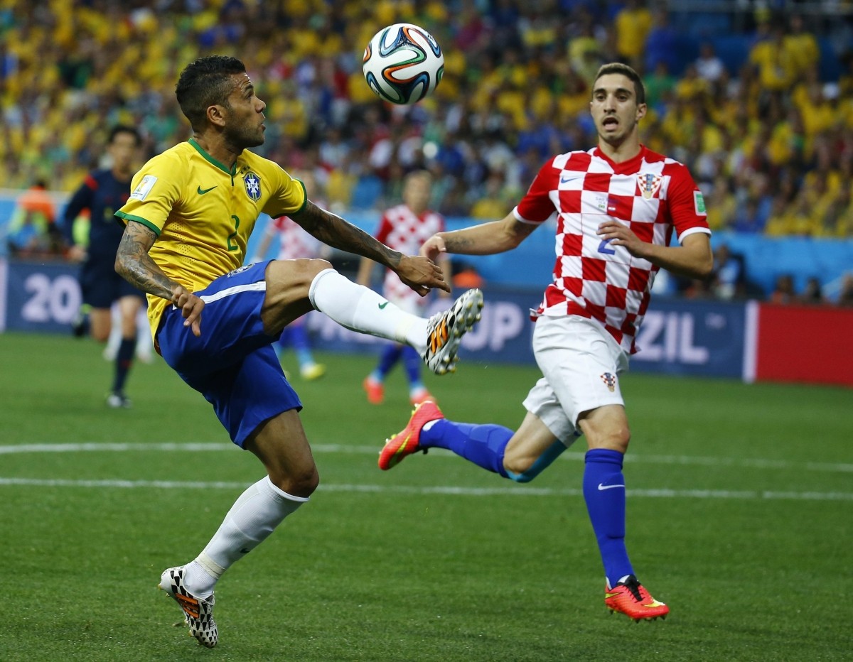 Croatia's Vrsaljko and Brazil's Alves fight for the ball Brazil v Croatia