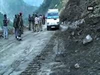 Flooded Kashmir s national highway re opens after 13 days of closure due to landslide