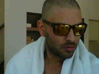 Yuvraj Singh post cutting his hair for the treatment