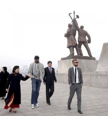 Dennis Rodman and his company visit the Tower of Juche Idea in Pyongyang in this picture released March 1, 2013. REUTERS Dennis Rodman and his company visit the Tower of Juche Idea in Pyongyang in this picture released March 1, 2013. REUTERS