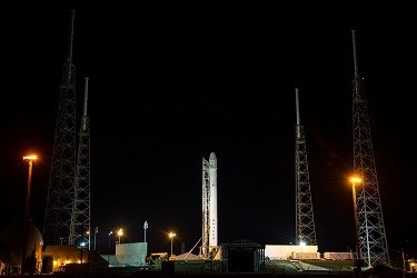 The SpaceX Falcon 9 rocket with a Dragon commercial cargo craft on top rests at its launch pad on March 1, 2013, at the Cape Canaveral Air Force Station in Florida (NASA/Bill Ingalls)