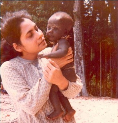 Author with a baby from Jarawa tribe. Madhumala