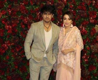 Sonu Nigam and his wife Madhurima at Deepika Padukone's reception Sonu Nigam and his wife at Deepika Padukone's reception