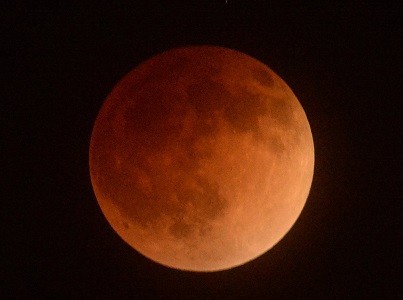 The moon is shown in eclipse from Los Angeles (Reuters) The moon is shown in eclipse from Los Angeles (Reuters)
