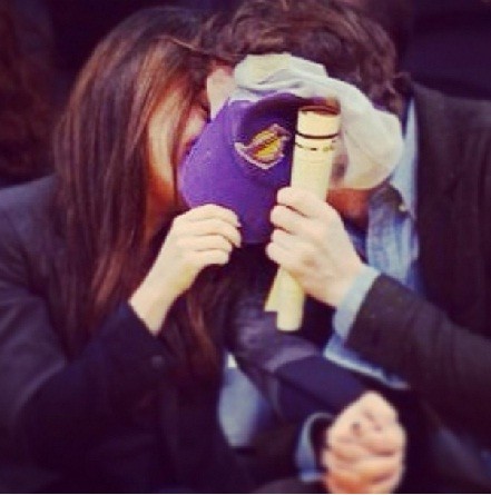 Mila Kunis and Ashton Kutcher share a public kiss