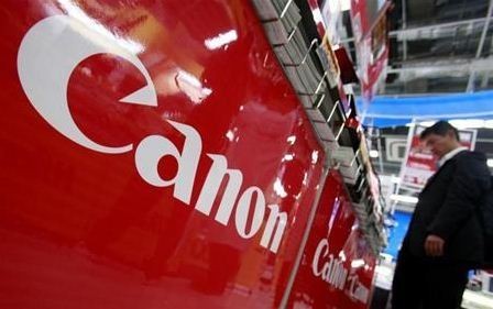 A logo of Canon Inc is pictured at an electronics store in Tokyo October 23, 2012.