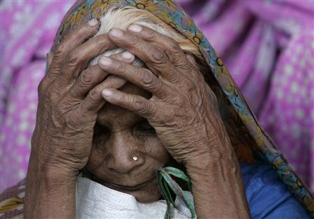 A victim of Bhopal gas tragedy attends a demonstration in Bhopal