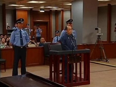 China's former railways minister, Liu Zhijun, attends a trial for charges of corruption and abuse of power at a courthouse in Beijing in this still image taken from video dated June 9, 2013.