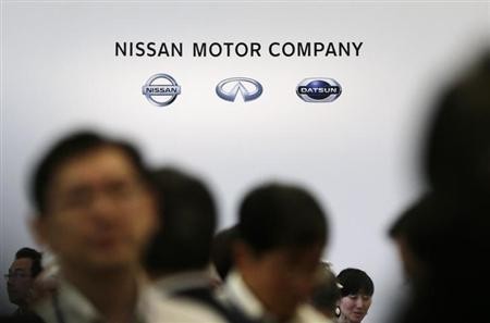 Nissan Motor Company's logo is seen at a reception with shareholders after the general shareholders' meeting in Yokohama, south of Tokyo, June 25, 2013.