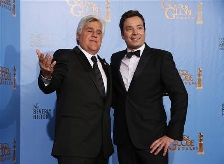 Late night talk show hosts Jay Leno (L) and Jimmy Fallon pose backstage at the 70th annual Golden Globe Awards in Beverly Hills, California, January 13, 2013.