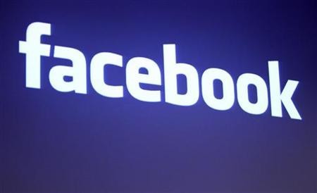 The Facebook logo is shown at Facebook headquarters in Palo Alto, Calif., May 26, 2010. The Facebook logo is shown at Facebook headquarters in Palo Alto