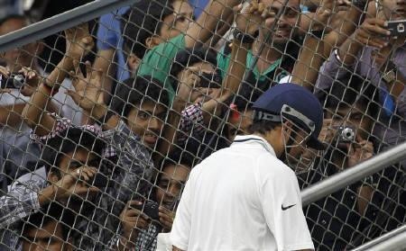 Disappointed Sachin Tendulkar leaves the crease after failing to score his 100th century. Sachin Tendulkar