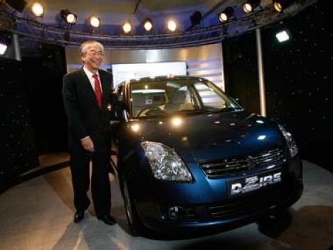 Managing Director of Maruti Suzuki, Shinzo Nakanishi, poses with the Dzire