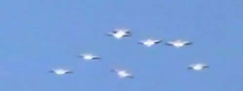Eight Bird like Objects Spotted Flying in Synchronised Manner