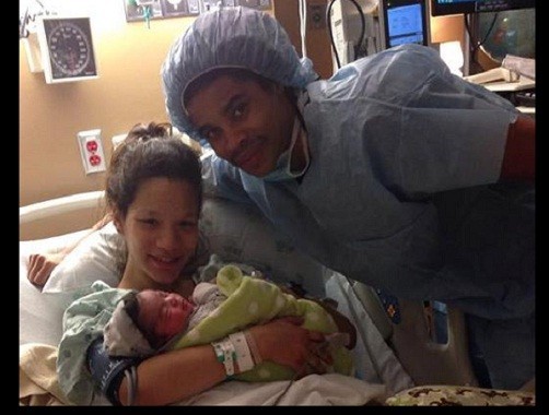 Brianna Marshall and Bruce Powell with their newborn son, Kayden Powell, just four days before the baby was stolen from its crib/Facebook Brianna Marshall and Bruce Powell with their newborn son, Kayden Powell, just four days before the baby was stolen from its crib/Facebook