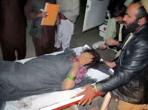 A wounded Afghan girl is rushed to a hospital in Helmand province December 31, 2014. A wounded Afghan girl is rushed to a hospital in Helmand province December 31, 2014.