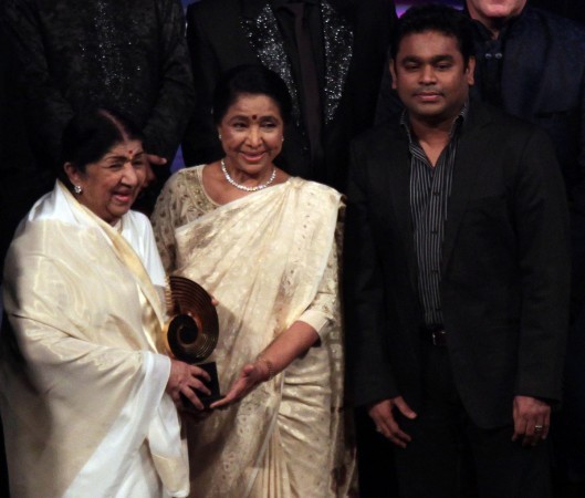 File photo: Lata Mangeshkar and Asha Bhosle with AR Rahman. Asha Bhosle birthday: Big sister Lata Mangeshkar posts beautiful message on singer's 85th birthday