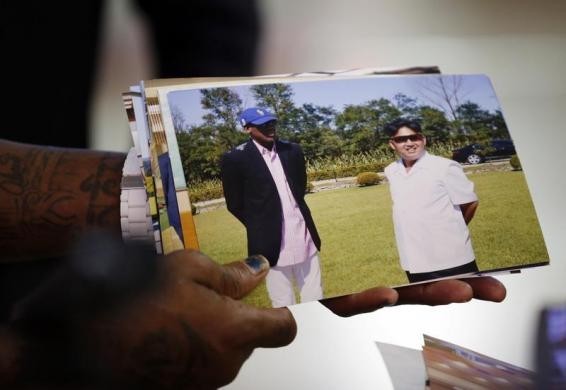 Dennis Rodman shows a picture which he took with North Korean leader Kim Jong-un as he arrives at Beijing Capital International Airport September 7, 2013. REUTERS Dennis Rodman shows a picture which he took with North Korean leader Kim Jong-un as he arrives at Beijing Capital International Airport September 7, 2013. REUTERS