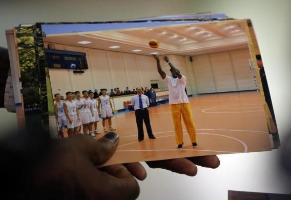 Dennis Rodman shows a picture of himself during his visit to North Korea as he arrives at Beijing Capital International Airport September 7, 2013. REUTERS Dennis Rodman shows a picture of himself during his visit to North Korea as he arrives at Beijing Capital International Airport September 7, 2013. REUTERS