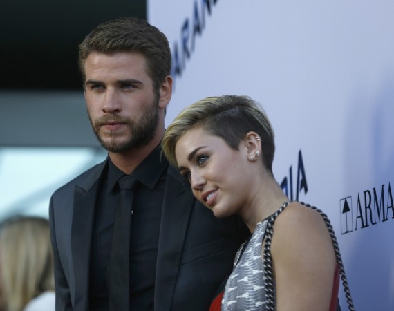 Miley Cyrus and Liam Hemsworth Miley Cyrus and Liam Hemsworth