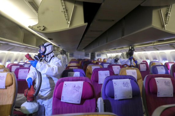 Members of the Thai Airways crew disinfect the cabin of an aircraft of the national carrier during a procedure to prevent the spread of the coronavirus at Bangkok's Suvarnabhumi International Airport, Thailand, January 28, 2020. Members of the Thai Airways crew disinfect the cabin of an aircraft of the national carrier during a procedure to prevent the spread of the coronavirus at Bangkok's Suvarnabhumi International Airport, Thailand, January 28, 2020.
