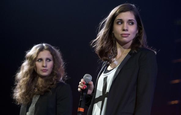 Russian punk band Pussy Riot members Maria Alyokhina (L) and Nadezhda Tolokonnikova speak on stage during Amnesty International's Russian punk band Pussy Riot members Maria Alyokhina (L) and Nadezhda Tolokonnikova speak on stage during Amnesty International's