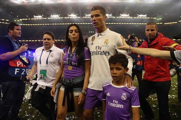 Cristiano Ronaldo with his girlfriend and son. Cristiano Ronaldo, Cristiano Ronaldo tax, Cristiano Ronaldo tax fraud, Real Madrid, Cristiano Ronaldo news