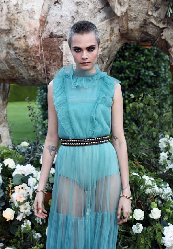 Cara Delevingne flaunts her tattoo at Save the Elephants event - Photos ...