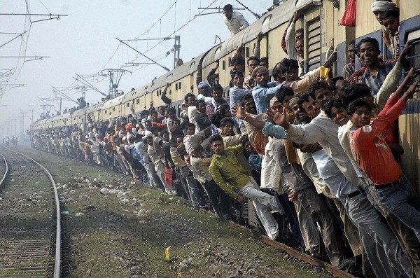 Passengers travel in an overcrowded train in the eastern Indian city of Patna.