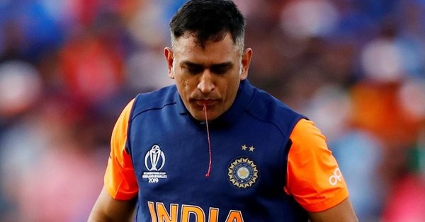 MS Dhoni was seen spitting blood out after sucking his injured thumb MS Dhoni