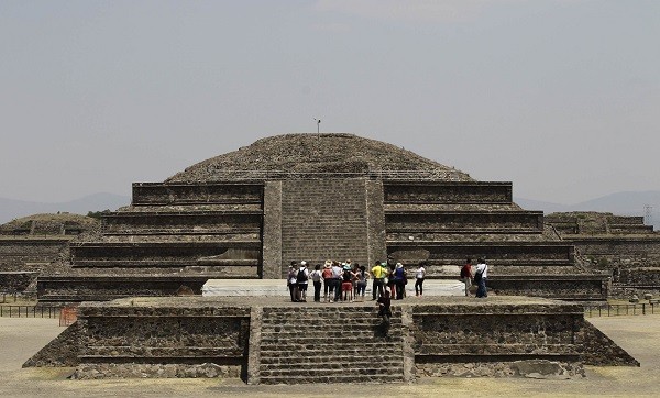Visitors look on at the archaeological area of the Quetzalcoatl Temple near the Pyramid of the Sun at the Teotihuacan archaeological site, about 60 km (37 miles) north of Mexico City. (Credit: Reuters) Visitors look on at the archaeological area of the Quetzalcoatl Temple near the Pyramid of the Sun at the Teotihuacan archaeological site
