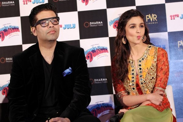 Karan Johar and Alia Bhatt Karan Johar with Alia Bhatt at Tralier launch of upcoming film 'Humpy Sharma Ki Dulhania'