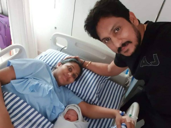 Ajai Rao with his wife Swapna and newborn. Ajai Rao with his Daughter