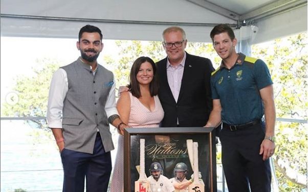 Kohli and Paine with the Australian Prime Minister. Virat Kohli Tim Paine