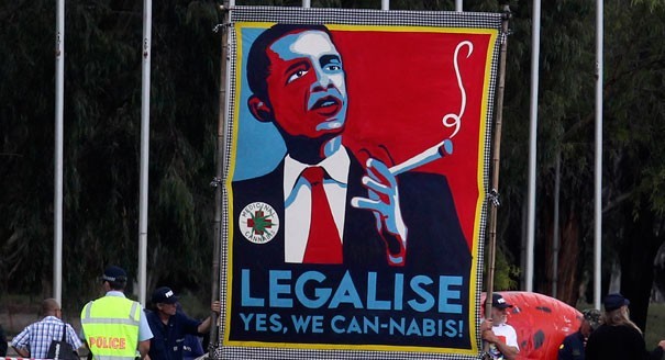 A banner showing Obama smoking cannabis. However, hopes that Obama would be a more tolerant drug warrior have gone up in smoke. | Reuters