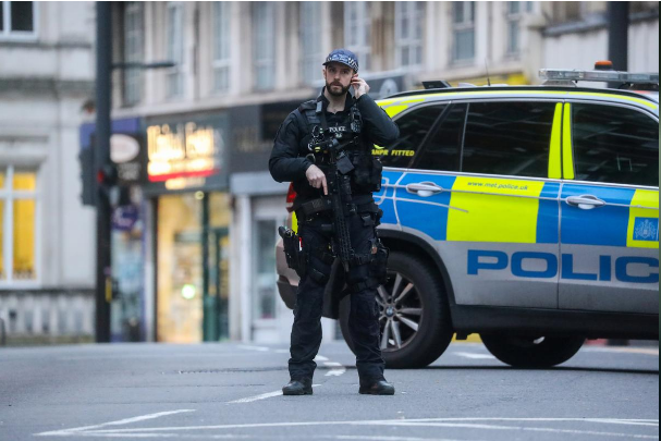 A Police officer is seen near a site where a man was shot by armed officers in Streatham, south London, Britain, February 2, 2020. REUTERS/Simon Dawson A Police officer is seen near a site where a man was shot by armed officers in Streatham, south London, Britain, February 2, 2020. REUTERS/Simon Dawson